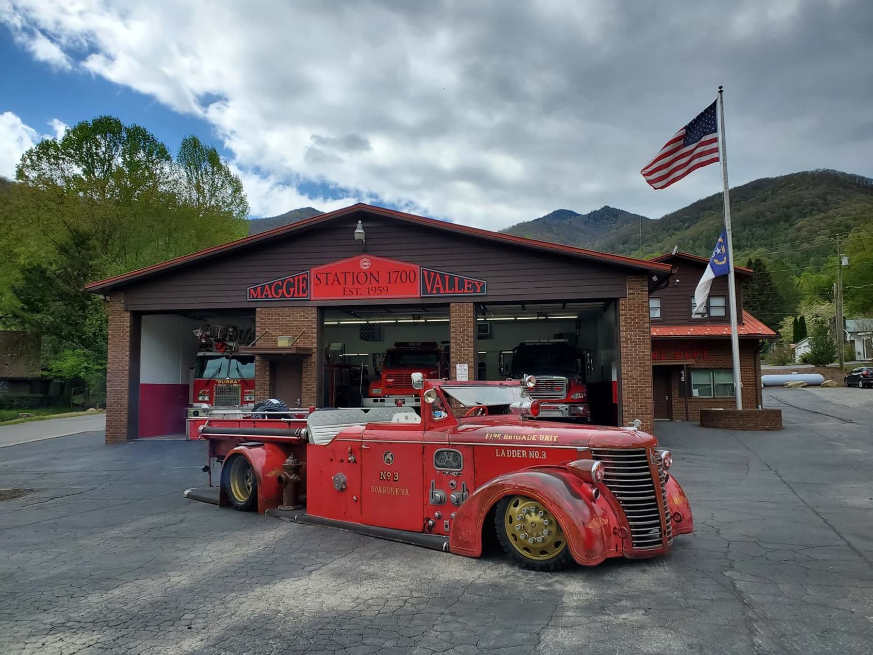 Diesel Wheels shop frontage with red rat rods parked outside
